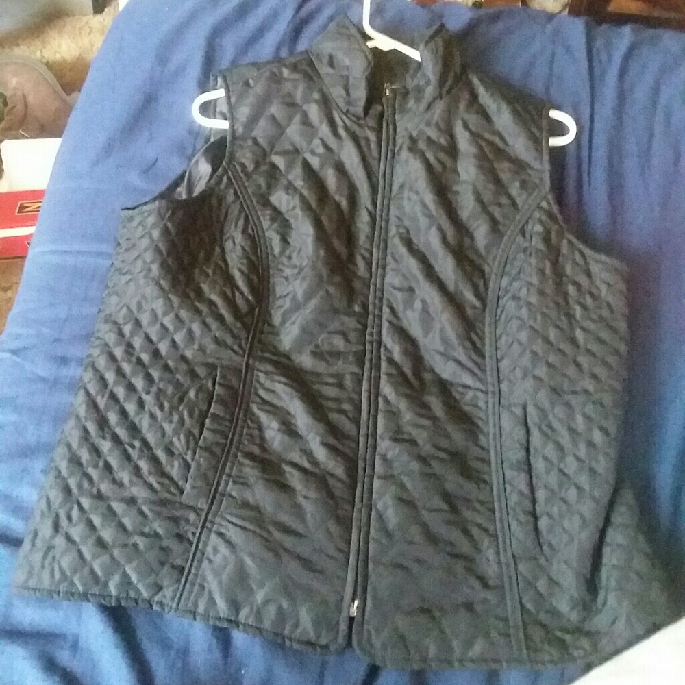 Black sleeveless jacket